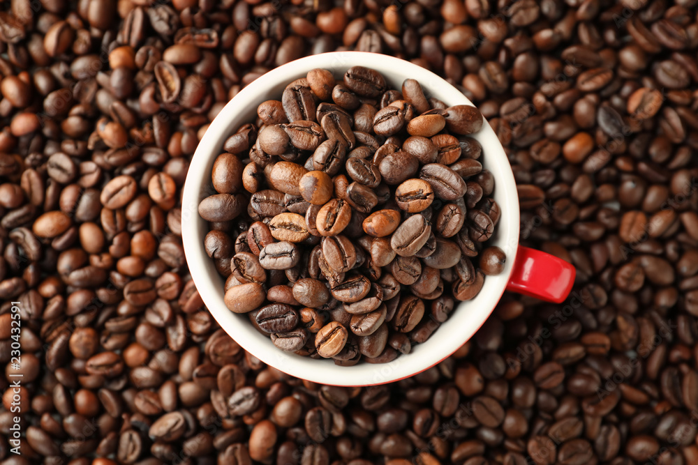 Cup on roasted coffee beans Cup on roasted coffee beans
