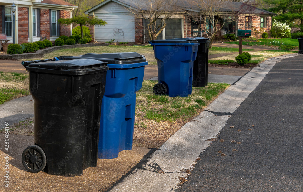 Trash Day Cans out for pickup Suburban Trash Day Cans out for pickup Suburban