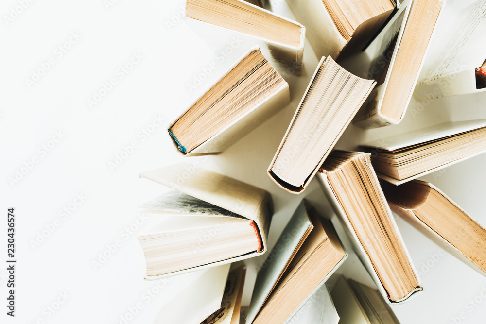 Obraz premium Books on white background. Flat lay, top view minimal concept.