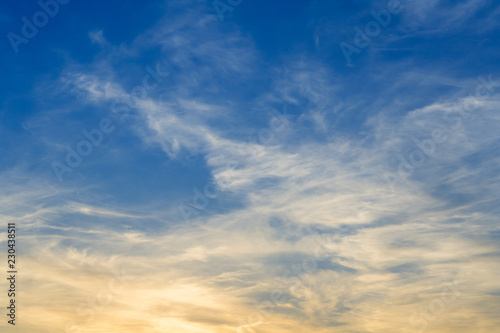 Fototapeta Naklejka Na Ścianę i Meble -  View on a golden clouds in evening sky