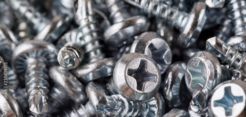 construction screws close-up background