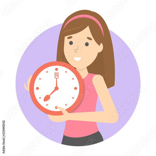 Woman holding clock as a metaphor of planing meal.