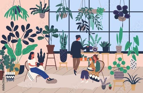 Group of people or friends spending time at greenhouse or home garden with plants growing in pots. Young men and women caring for houseplants. Trendy vector illustration in flat cartoon style.