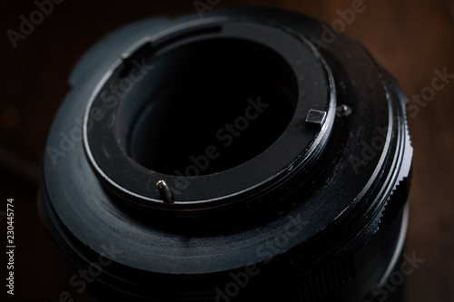 old film camera lens on white background