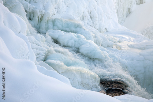 frozen waterfall Tannforsen in winter, Sweden
