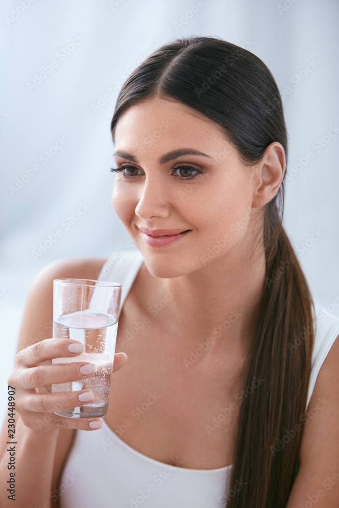 Happy Woman Drinking Water. Beautiful Female With Glass Of Water Happy Woman Drinking Water. Beautiful Female With Glass Of Water