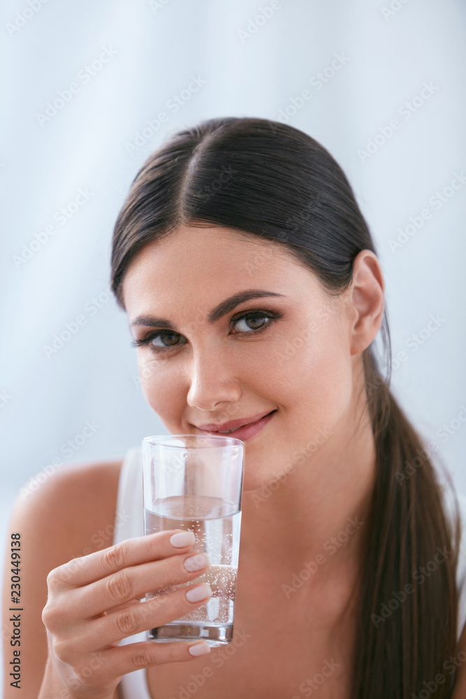 Happy Woman Drinking Water. Beautiful Female With Glass Of Water Happy Woman Drinking Water. Beautiful Female With Glass Of Water