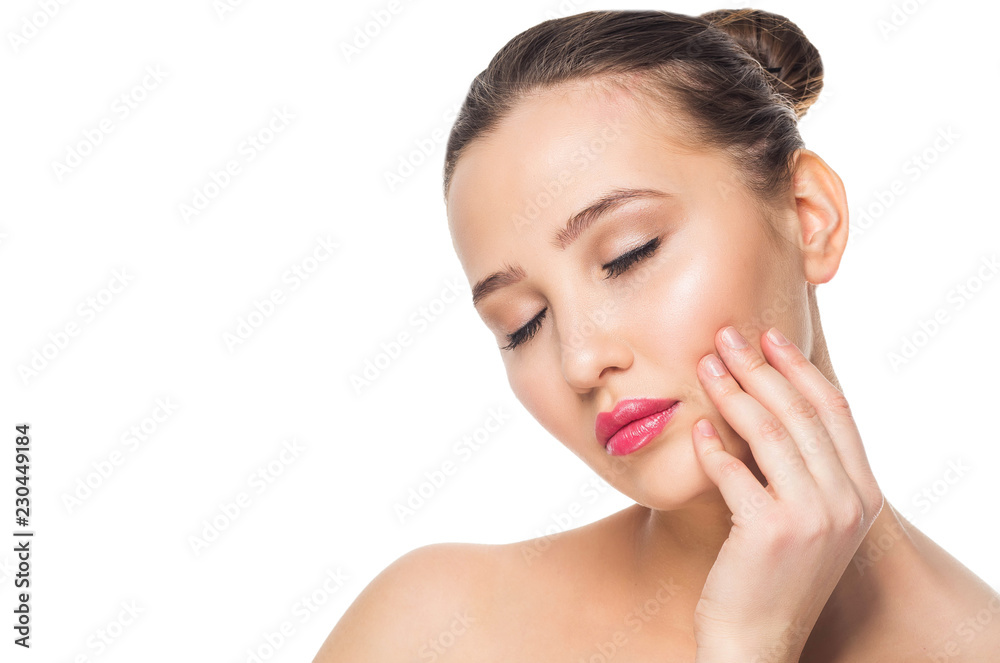 Young attractive girl with clean face skin with closed eyes on white background, copy space. Spa, cosmetology, make up