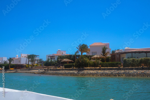 Beautiful view of the coastline with houses and hotels on the red sea. Tourist region in Egypt. Hurghada and its traditions. Stock photo for design © subjob