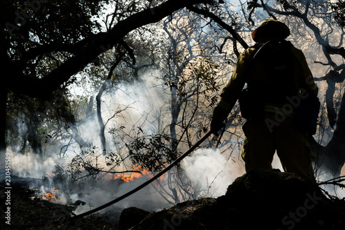 Firefighter in middle of fire in Sonoma and Napa, California, USA