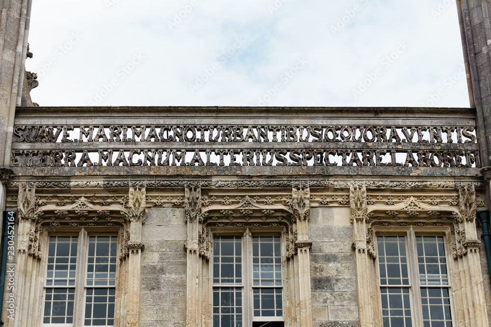 Lettering with windows of highcliffe castle in christchurch, south england