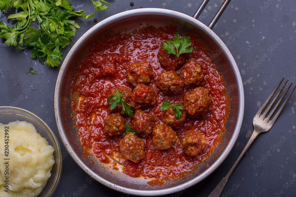 close up of meatballs, tomato sauce and mash close up of meatballs, tomato sauce and mash