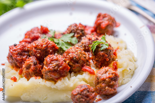 Tasty details of tomato meatballs with mash