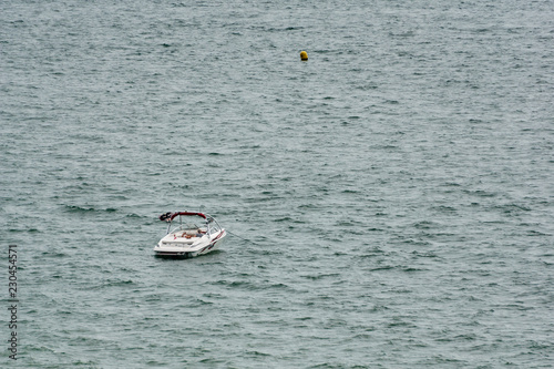 small boat alone in the sea