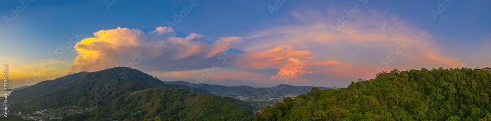 .aerial view scenery sunset red cloud in blue sky above Patong mountain