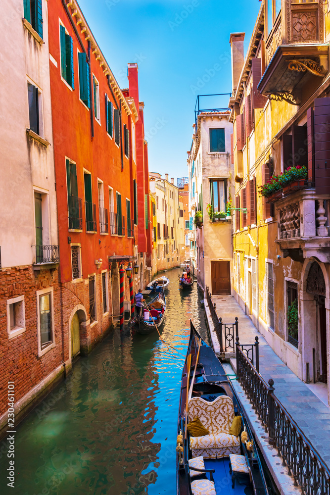 Picturesque buildings and gondolas on one of the canals in Venice, Italy.