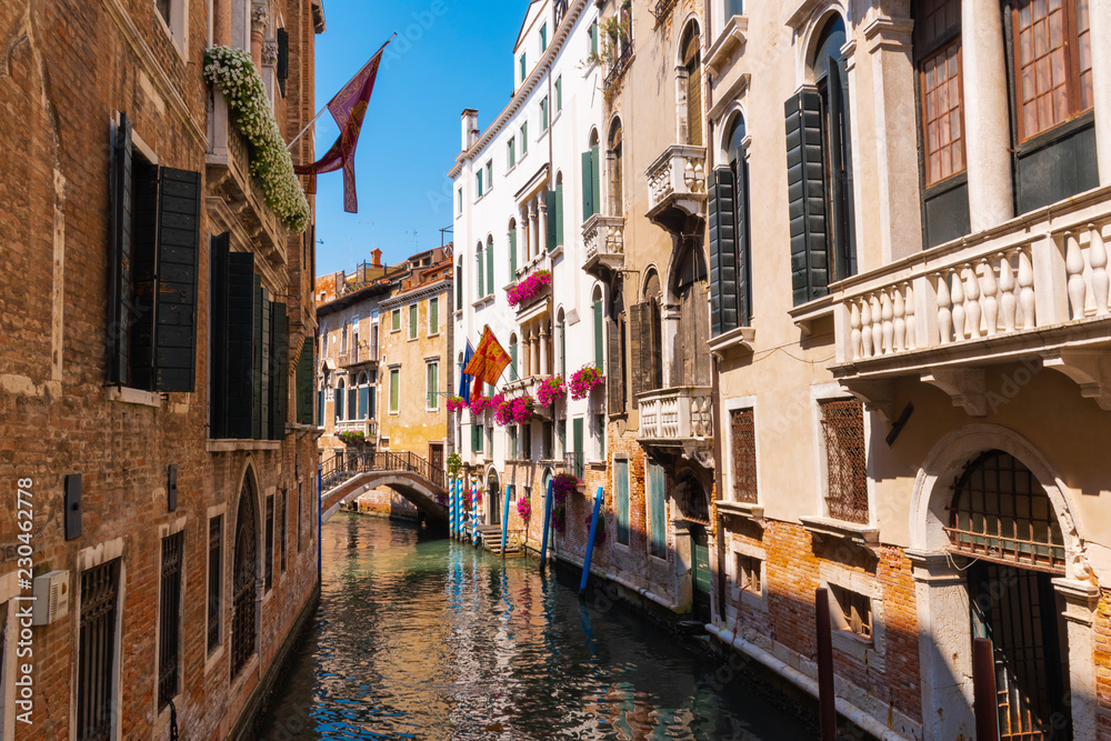 Picturesque buildings on a deserted canal in Venice, Italy.