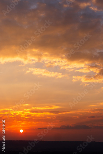 colorful dramatic sky with cloud at sunset.