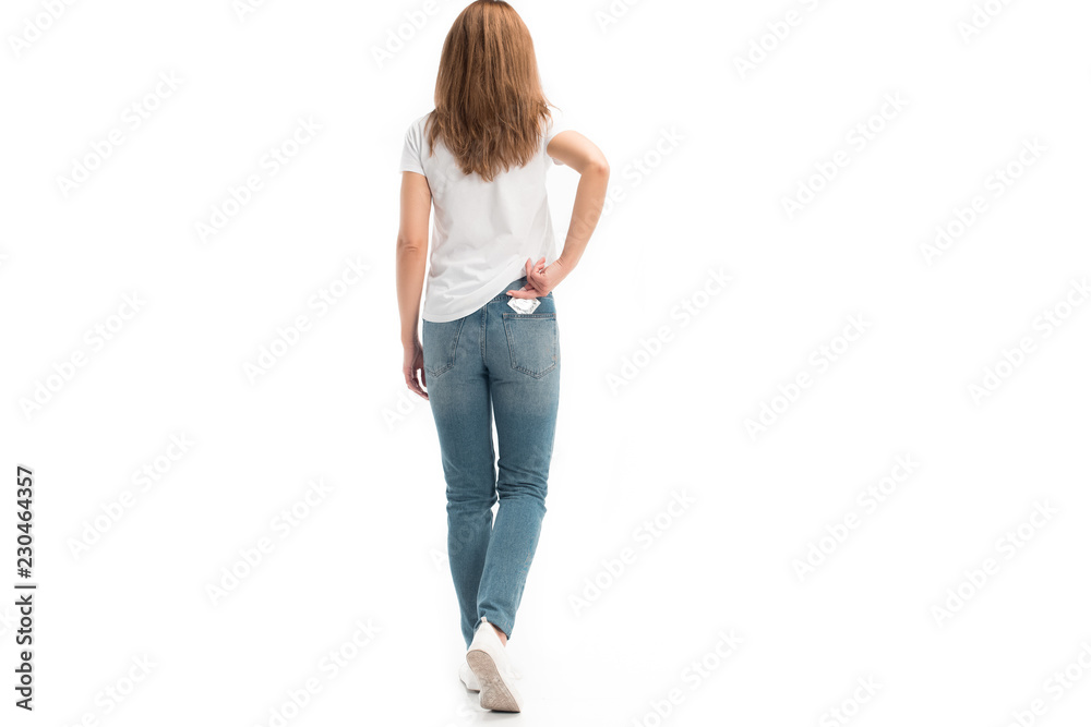 back view of woman taking condom from pocket isolated on white, world aids day concept back view of woman taking condom from pocket isolated on white, world aids day concept
