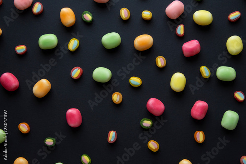 colorful candy on black background