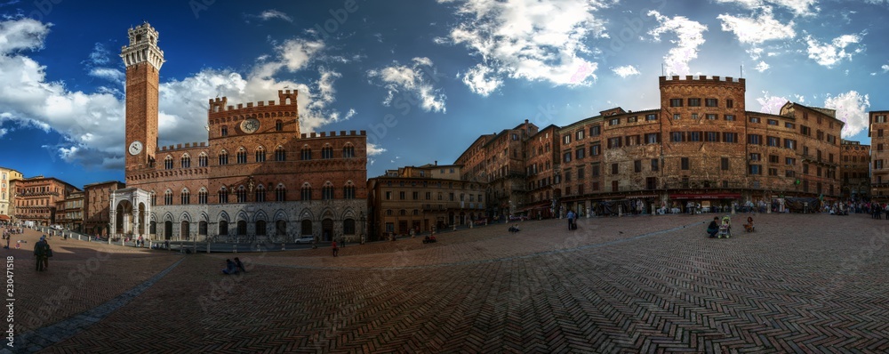 Piazza del Campo in Siena, Tuscany, showing the Palazzo Pubblico and the Torre del Mangia tower
