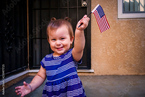 little girl with american flag