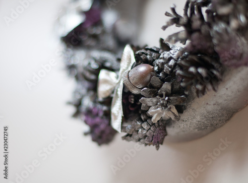 christmas wreath in gray and silver colour on bright background