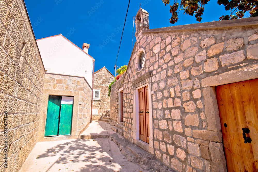 Old stone narrow street and chapel in Cavtat