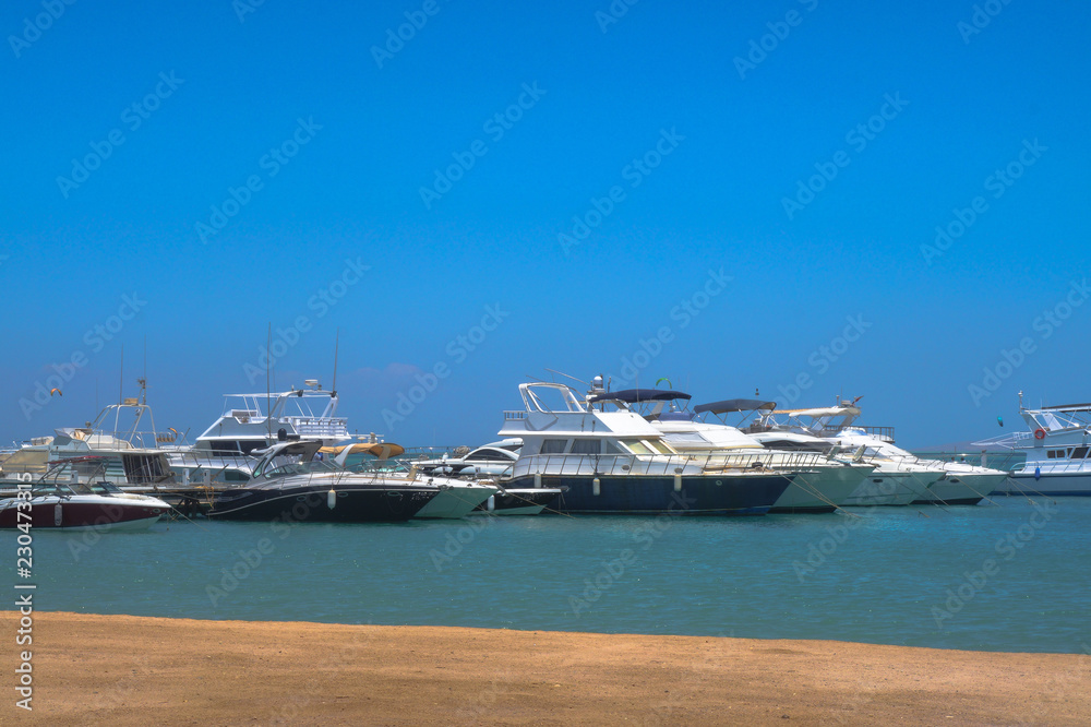 Red Sea, yachts and boats in the port of Egypt. Hurghada and Cairo Asia. Stock photo for design