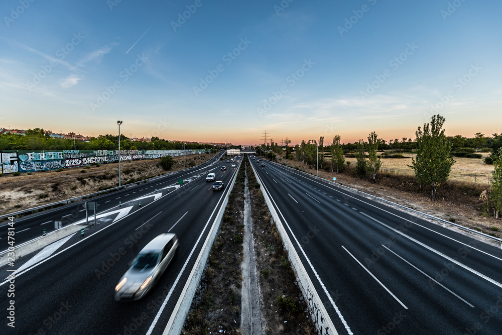 Fototapeta premium The M-40 orbital motorway circles the central districts of Madrid, the capital city of Spain.