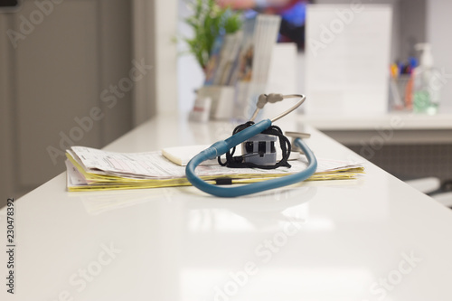 A patient's files and stethoscope