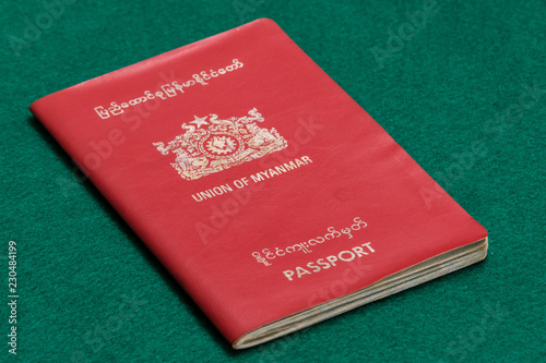 Myanmar passport on green table