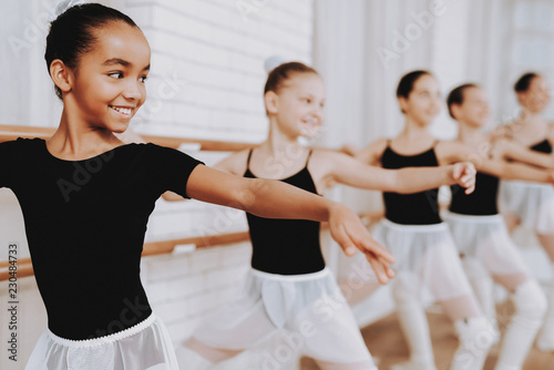Fényképezés Ballet Training of Group of Young Girls Indoors.