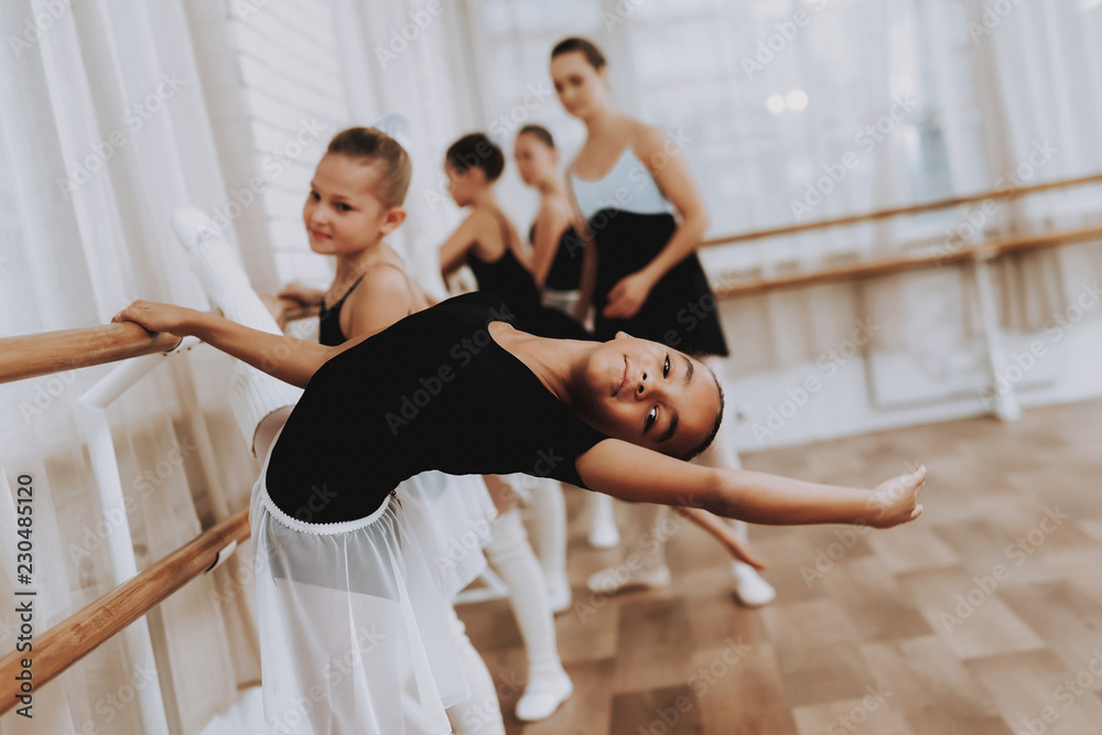 Fototapeta premium Ballet Training of Group of Girls with Teacher.