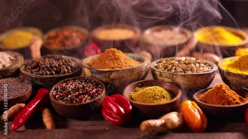 Assorted Spices and wooden bowl of smoke