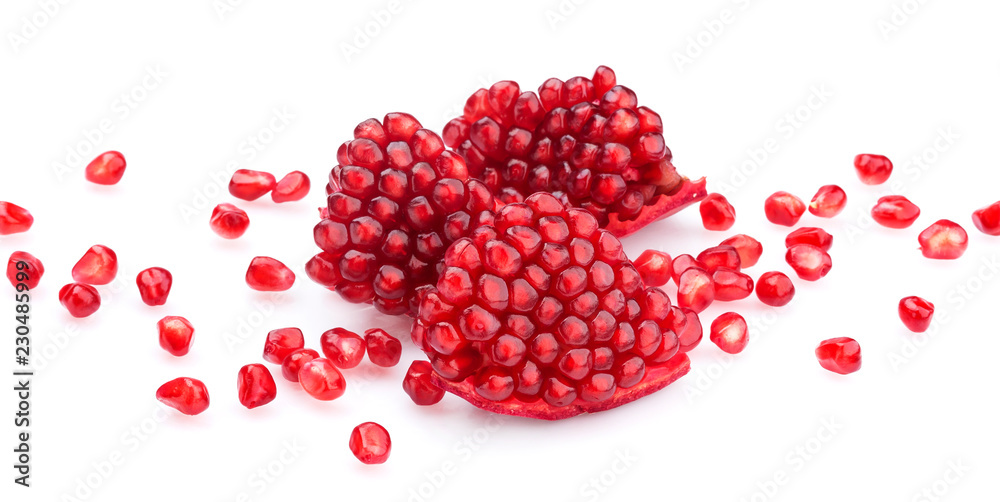 Ripe pomegranate seeds isolated on white Ripe pomegranate seeds isolated on white