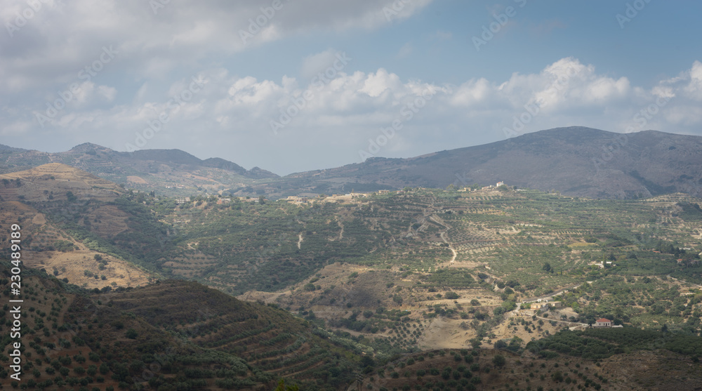 Hania, Crete - 09 25 2018: Polirinia. Small mountain. Panoramic view on fields and mountains