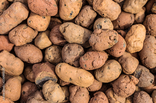 Expanded clay aggregate gravel. Material used for construction close-up. photo