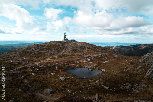 Scenic view of Ulriken Peak in Bergen Norway with Radio Communications Tower overlooking Horizon and City
