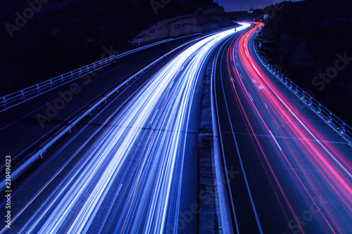 Highway car light trails at night