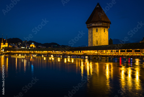 View of Chapel Bridge in Lake Lucerne at Night
