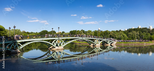 Tourists on the bridge in the museum-reserve Tsaritsyno