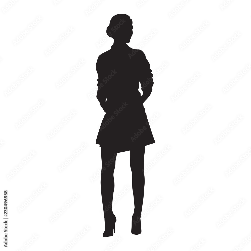 Slim young woman standing in high heels shoes and mini skirt. Isolated vector silhouette, front view Slim young woman standing in high heels shoes and mini skirt. Isolated vector silhouette, front view
