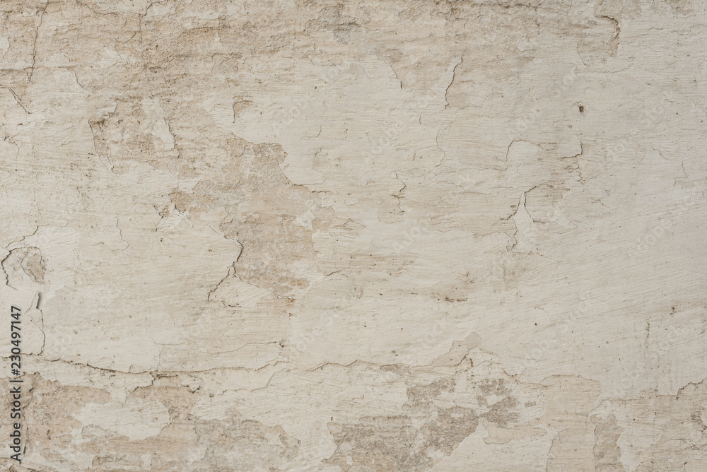 Wall fragment with scratches and cracks. It can be used as a background Wall fragment with scratches and cracks. It can be used as a background