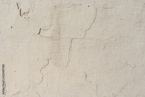 Wall fragment with scratches and cracks. It can be used as a background © chernikovatv