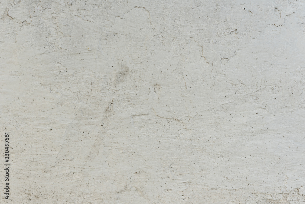 Wall fragment with scratches and cracks. It can be used as a background Wall fragment with scratches and cracks. It can be used as a background