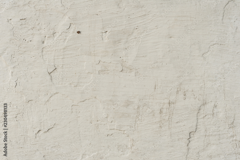 Wall fragment with scratches and cracks. It can be used as a background Wall fragment with scratches and cracks. It can be used as a background