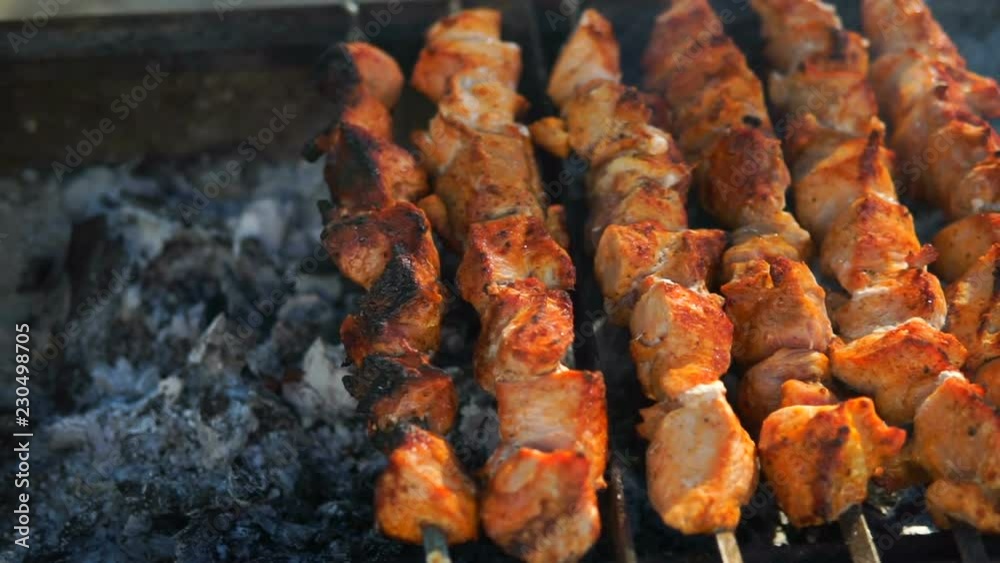 Barbecue With Delicious Grilled Meat On Grill. Barbecue Party. Chicken meat pieces being fried on a charcoal grill . Barbecue With Delicious Grilled Meat On Grill. Barbecue Party. Chicken meat pieces being fried on a charcoal grill .