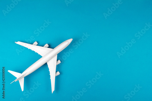 modern plane isolated on blue backdrop. Concept of aircraft industry