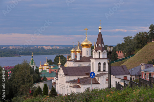 Scenic view at St. Elijah's Church, domes of Church of St. John the Baptist and walls of Nizhny Novgorod Kremlin with Volga river in the background